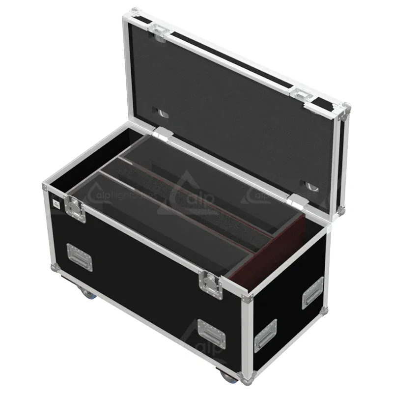 Empty flight case for 2x Elation KL Panel XL showing precision-cut slots and central accessory compartment