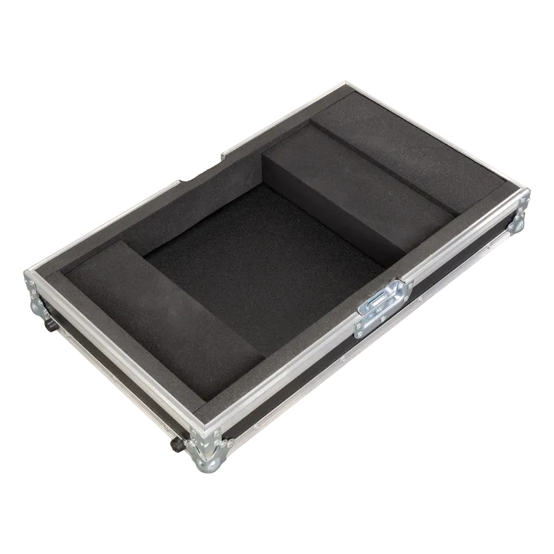 Empty interior of the DJM-V5 case highlighting the cable doghouse and specialized foam protection
