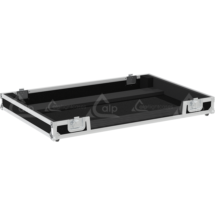 Empty interior of the flight case for Pioneer DDJ-RZX showing precision CNC-cut foam for triple screen protection