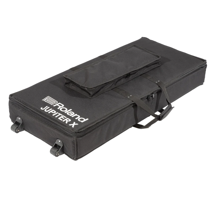 Side profile view of the synthesizer bag, highlighting the exterior pocket and corner wheels