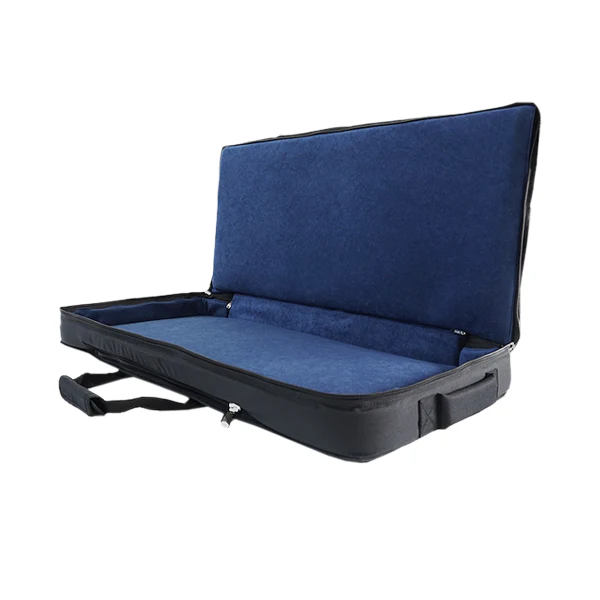 View of the open protective bag without the equipment, highlighting the plush blue velvet interior and 11mm foam padding