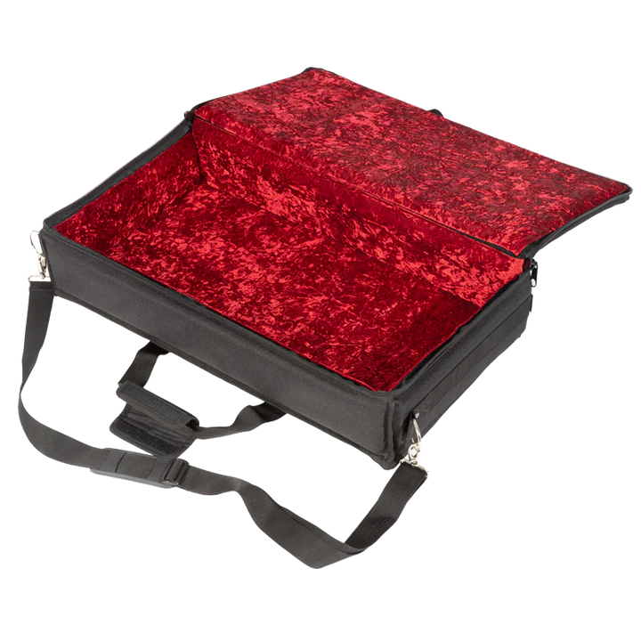 View of the open protective bag without the equipment, highlighting the plush red velvet interior and 11mm foam padding