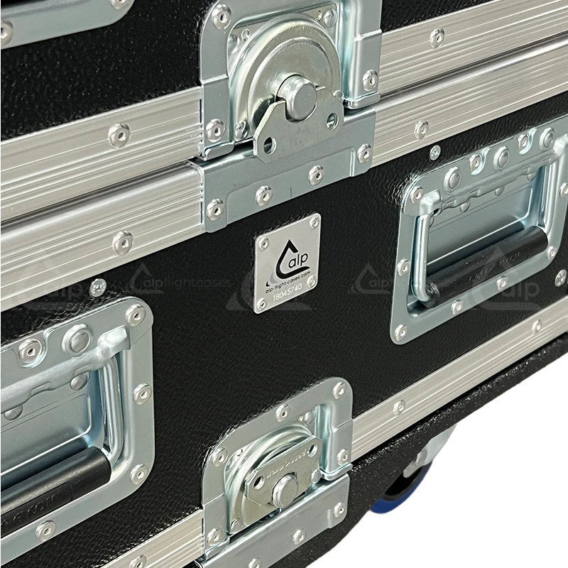 Close-up of the sliding latch system, rotary cam latch, and large case corners on the ALP XRACK series