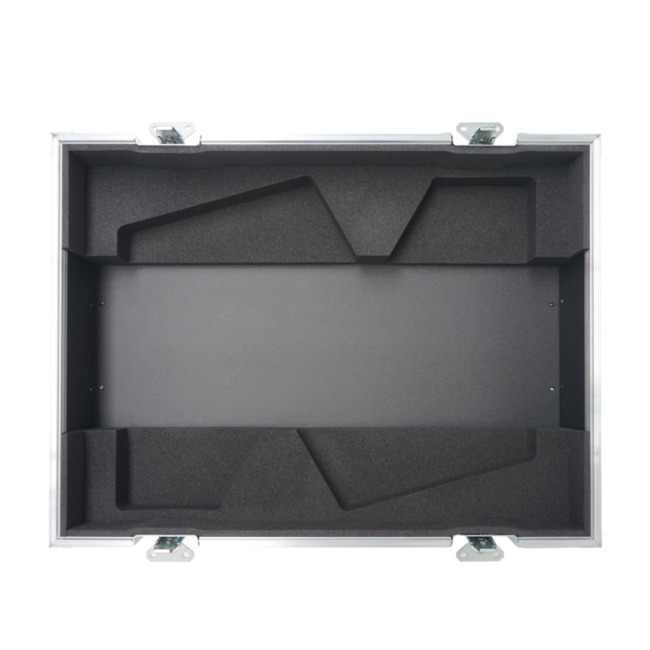 Empty interior of the flight case for 2x APG DX15 showing precision CNC-cut foam for high-density audio protection